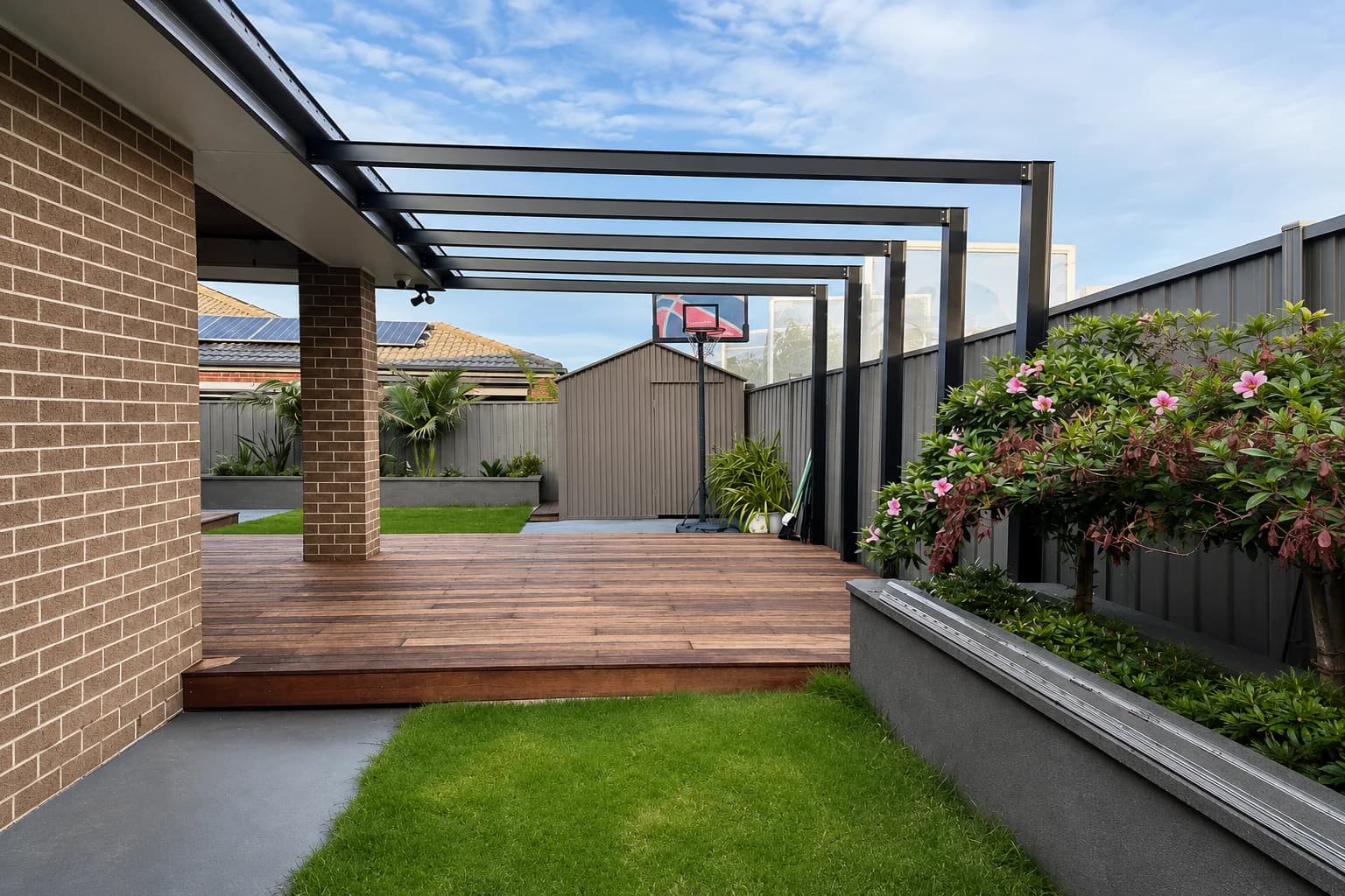 Aluminium pergola creating outdoor entertaining area